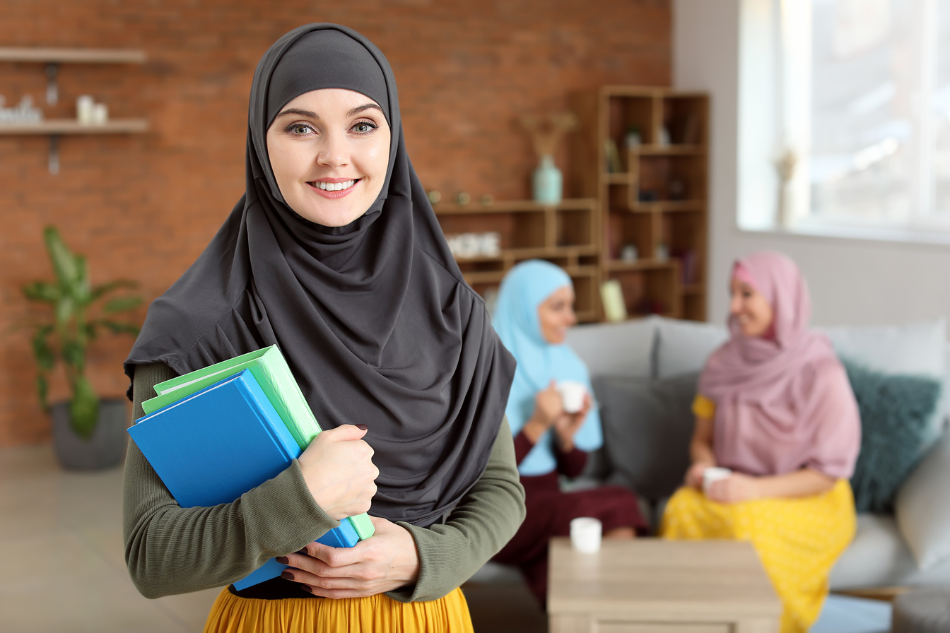 Female Muslim Student at Home